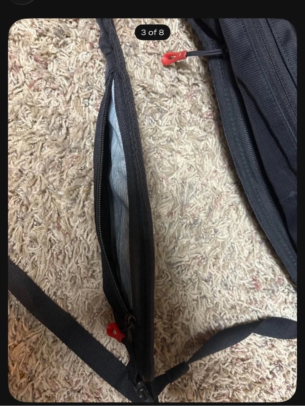 Sherpani Black Sling Bag with Red Accents